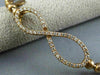 ESTATE .70CT DIAMOND 14KT ROSE GOLD 3D INFINITY FLEXIBLE LOVE BANGLE BRACELET