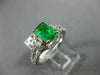 1.44CT DIAMOND & COLOMBIAN EMERALD 14KT 2 TONE GOLD 3 STONE HALO ENGAGEMENT RING