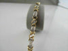 ESTATE WIDE 14KT TWO TONE 3.45CTW DIAMOND LOVE BRACELET