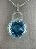 ESTATE LARGE 6.60CT DIAMOND & BLUE TOPAZ 14KT WHITE GOLD HALO ROUND HALO PENDANT