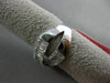 ESTATE 1.12CT ROUND & BAGUETTE DIAMOND 18KT WHITE GOLD CRISS CROSS INFINITY RING