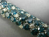 ESTATE EXTRA LARGE 56.98CT WHITE & BLUE DIAMOND 18KT WHITE GOLD TENNIS BRACELET