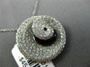 ESTATE LARGE 1.34CT DIAMOND & ONYX 18KT WHITE GOLD SWIRL SHELL FLOATING PENDANT