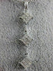 LARGE .68CT DIAMOND 18KT WHITE GOLD GRADUATING JOURNEY FLOATING PENDANT