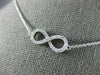 ESTATE .40CT DIAMOND 18KT WHITE GOLD 3D CLASSIC INFINITY LOVE NECKLACE