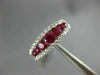 1.16CT DIAMOND & AAA RUBY 18KT WHITE GOLD 3D ROUND GRADUATING ANNIVERSARY RING