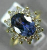 1.83CT DIAMOND & AAA OVAL TANZANITE 14KT YELLOW GOLD FLOWER HALO ENGAGEMENT RING