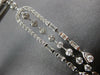 LONG 1.25CT DIAMOND 14KT WHITE GOLD ROUND & BAGUETTE HORSESHOE HANGING EARRINGS