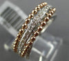 ESTATE .53CT DIAMOND 14KT WHITE & ROSE GOLD 3D MULTI ROW CRISS CROSS LOVE RING