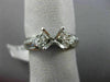 ESTATE .92CT DIAMOND ROUND & BAGUETTE 18KT WHITE GOLD SEMI MOUNT ENGAGMENT RING