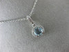ESTATE .82CT DIAMOND & AAA AQUAMARINE 14K WHITE GOLD ROUND HALO FLOATING PENDANT