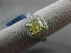 ESTATE 1.89CT GIA FANCY YELLOW DIAMOND 18KT WHITE GOLD HALO ENGAGEMENT RING