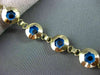 ESTATE 14KT YELLOW GOLD & ROUND BLUE CRYSTAL FLORAL EVIL EYE BRACELET #22954