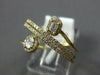 .50CT DIAMOND 18KT YELLOW GOLD ROUND BAGUETTE & OVAL MULTI ROW CRISS CROSS RING