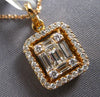 ESTATE .49CT DIAMOND 18KT ROSE GOLD ROUND & BAGUETTE CLUSTER SQUARE HALO PENDANT