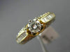 ESTATE 1.20CT ROUND & BAGUETTE DIAMOND 14KT YELLOW GOLD CLASSIC ENGAGEMENT RING