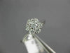 ESTATE .50CT ROUND DIAMOND 14KT WHITE GOLD CLASSIC SEVEN STONE FLOWER LOVE RING