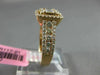 ESTATE LARGE 1.13CT ROUND & BAGUETTE DIAMOND 18KT ROSE GOLD HALO ENGAGEMENT RING