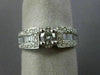 ESTATE .90CT ROUND & BAGUETTE DIAMOND 14KT WHITE GOLD FOUR PRONG ENGAGEMENT RING
