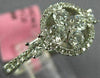 ESTATE .86CT DIAMOND 18KT WHITE GOLD 3D ROUND & PRINCESS FLOWER HALO LOVE RING