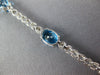 8.14CT DIAMOND & AAA BLUE TOPAZ 14KT WHITE GOLD 3D OVAL & ROUND TENNIS BRACELET