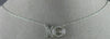 ESTATE .15CT DIAMOND 14K WHITE GOLD 3D DANCING DIAMOND XO FLOATING LOVE NECKLACE
