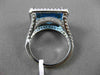 ESTATE 11.42CTW DIAMOND & AAA EMERALD CUT BLUE TOPAZ 14KT WHITE GOLD HALO RING