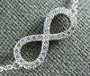ESTATE .40CT DIAMOND 18KT WHITE GOLD 3D CLASSIC INFINITY LOVE NECKLACE
