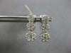 1.0CT DIAMOND 14KT WHITE GOLD 3D MULTI FLOWER JOURNEY SCREWBACK HANGING EARRINGS
