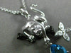 ESTATE .77CT DIAMOND & BLUE TOPAZ 14KT WHITE & BLACK GOLD PANTHER FLOWER PENDANT