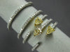 ESTATE LARGE 1.04CT WHITE & FANCY YELLOW DIAMOND 18KT TWO TONE GOLD 3D LOVE RING