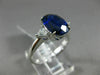 3.07CT TRILLION DIAMOND & OVAL SAPPHIRE 18KT WHITE GOLD 3 STONE ENGAGEMENT RING