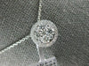 ESTATE LARGE .68CT DIAMOND 18KT WHITE GOLD CLASSIC ROUND CLUSTER HALO PENDANT