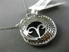ESTATE LARGE 1.34CT DIAMOND & ONYX 18KT WHITE GOLD SWIRL SHELL FLOATING PENDANT