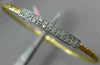 ESTATE .15CT DIAMOND 14KT TWO TONE GOLD ELONGATED PAVE FLEXIBLE BANGLE BRACELET