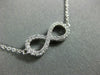 ESTATE .40CT DIAMOND 18KT WHITE GOLD 3D CLASSIC INFINITY LOVE NECKLACE