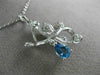 ESTATE .75CT DIAMOND & AAA PEAR SHAPE BLUE TOPAZ 14KT WHITE GOLD 3D BIRD PENDANT
