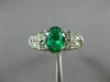 ESTATE 1.21CT DIAMOND & AAA OVAL EMERALD 14KT WHITE GOLD 3D LOVE ENGAGEMENT RING