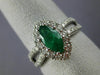 ESTATE 1.53CT DIAMOND & AAA EMERALD 18KT WHITE GOLD CLASSIC HALO ENGAGEMENT RING