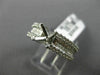 ESTATE .72CT DIAMOND 18KT WHITE GOLD ROUND & PRINCESS SEMI MOUNT ENGAGMENT RING