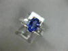 1.63CT ROUND DIAMOND & AAA OVAL TANZANITE 14K WHITE GOLD 3 STONE ENGAGEMENT RING