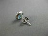 ESTATE 1.17CT DIAMOND & AAA BLUE TOPAZ 14KT WHITE GOLD ROUND HALO STUD EARRINGS