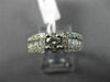 ESTATE .90CT ROUND & BAGUETTE DIAMOND 14KT WHITE GOLD FOUR PRONG ENGAGEMENT RING