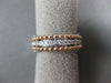 ESTATE .53CT DIAMOND 14KT WHITE & ROSE GOLD 3D MULTI ROW CRISS CROSS LOVE RING