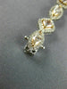 ESTATE 8.84CT WHITE & PINK DIAMOND 18KT WHITE & ROSE GOLD HALO TENNIS BRACELET