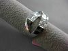 ESTATE 1.12CT ROUND & BAGUETTE DIAMOND 18KT WHITE GOLD CRISS CROSS INFINITY RING