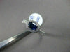 ESTATE 1.03CT DIAMOND & AAA SAPPHIRE 18KT WHITE GOLD HALO DESIGN ENGAGEMENT RING