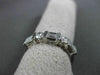 ESTATE .64CTW BAGUETTE & ROUND DIAMOND 14KT WHITE GOLD ANNIVERSARY RING F/G VSSI