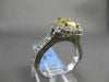 ESTATE 1.89CT GIA FANCY YELLOW DIAMOND 18KT WHITE GOLD HALO ENGAGEMENT RING