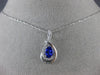 ESTATE .63CT DIAMOND & AAA TANZANITE 14KT WHITE GOLD OVAL INFINITY LOVE PENDANT